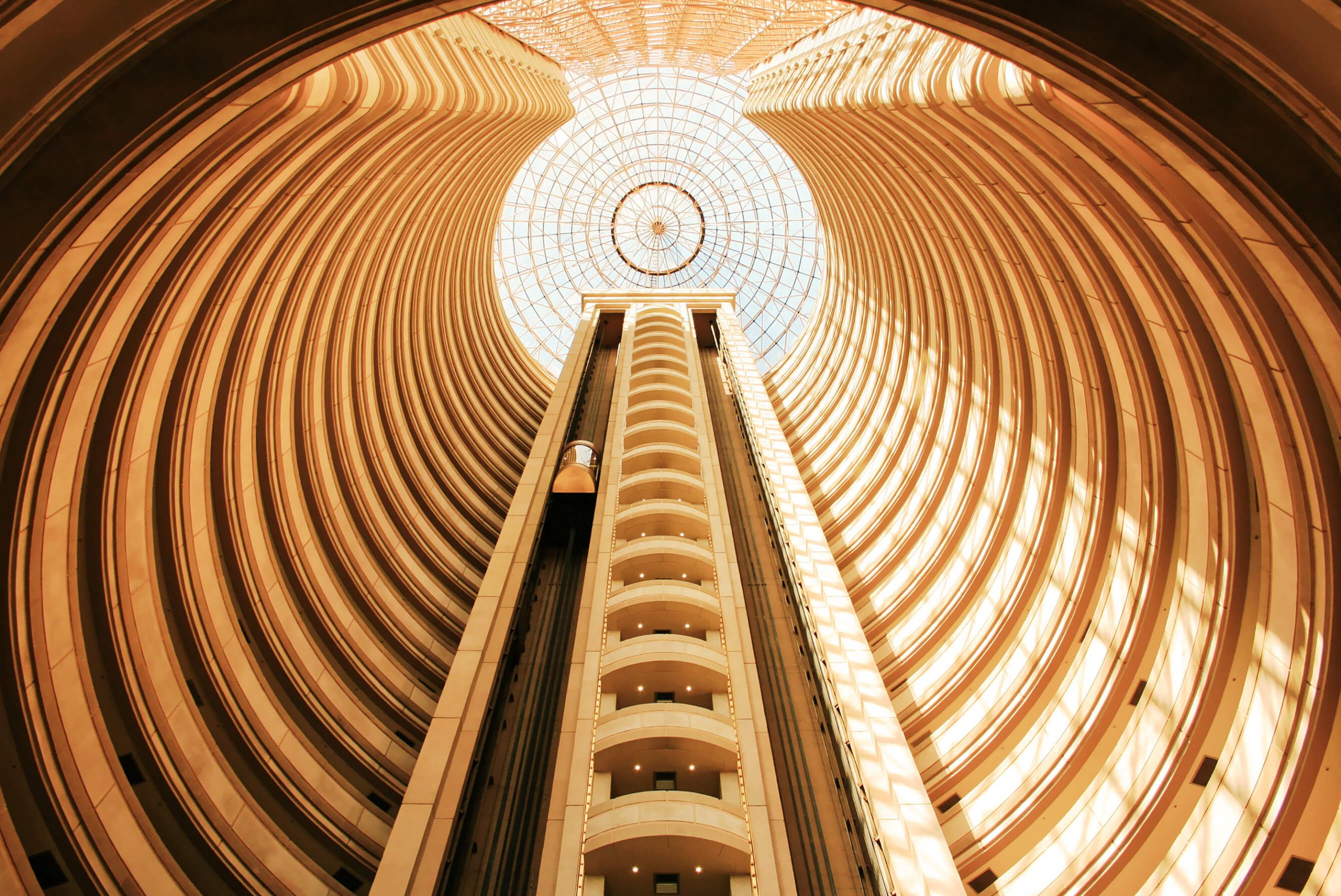 Sun shining through a multi-floor atrium