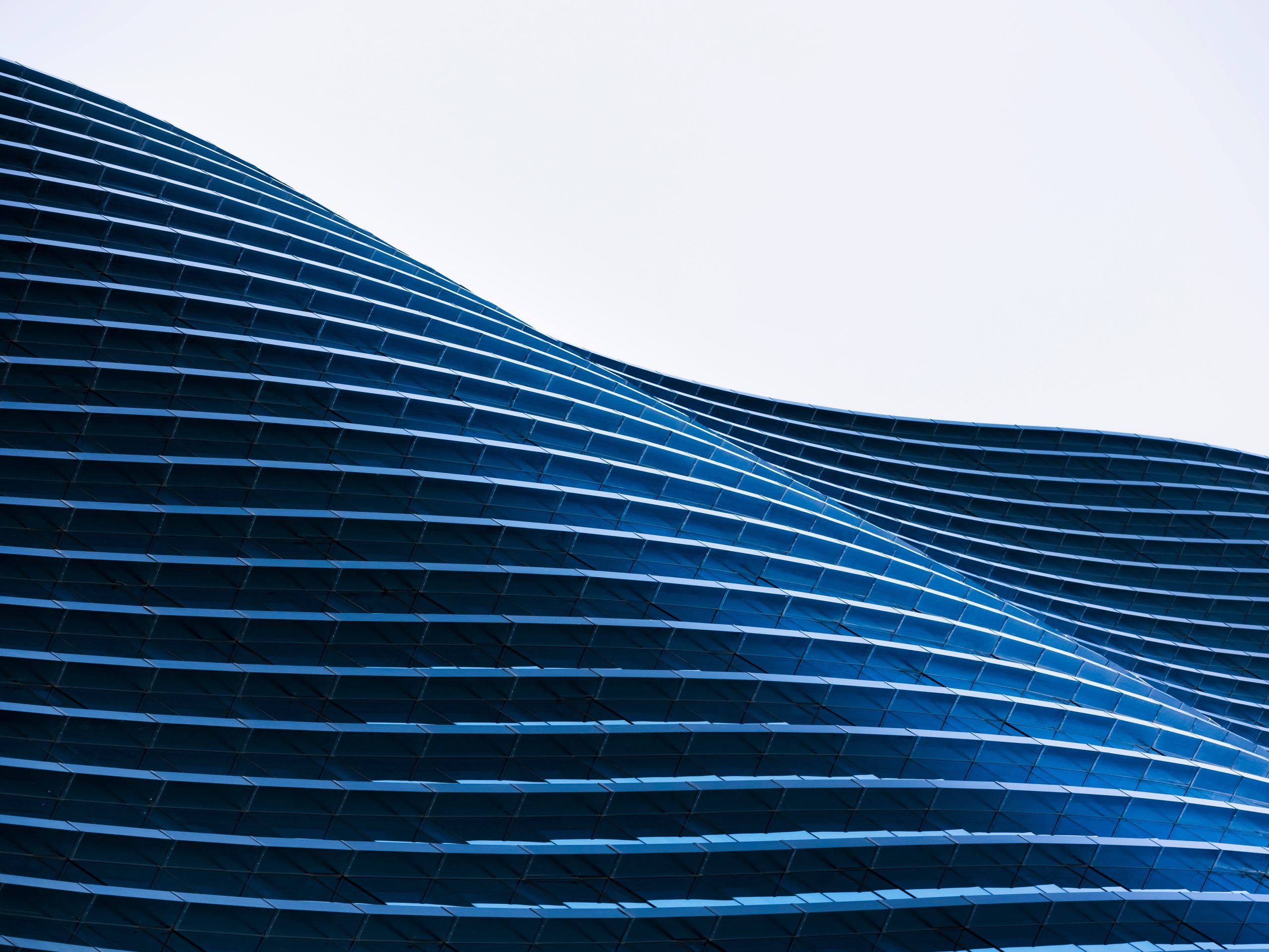 Curved glass wall of modern building